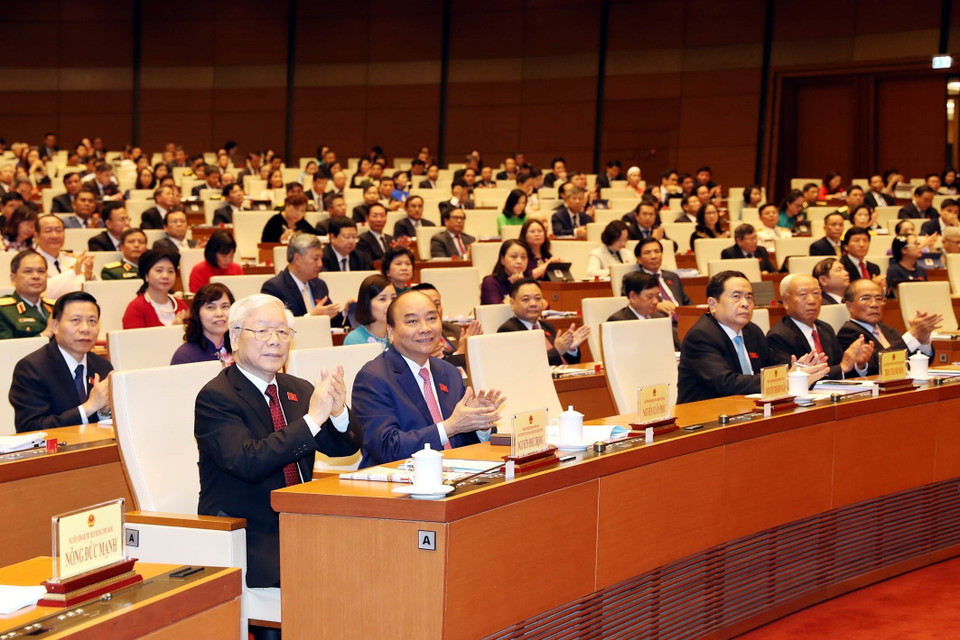 Tổng Bí thư, Chủ tịch nước Nguyễn Phú Trọng, Thủ tướng Nguyễn Xuân Phúc, nguyên Chủ tịch Quốc hội Nguyễn Văn An, Nguyễn Sinh Hùng dự phiên khai mạc. (Ảnh: Trọng Đức/TTXVN)