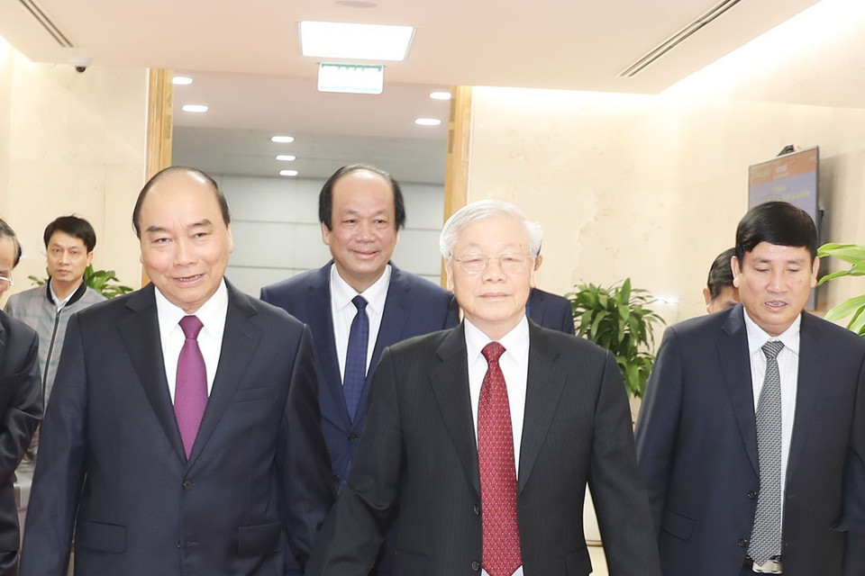 Thủ tướng Chính phủ Nguyễn Xuân Phúc đón Tổng Bí thư, Chủ tịch nước Nguyễn Phú Trọng đến dự Hội nghị. (Ảnh: Trí Dũng/TTXVN)