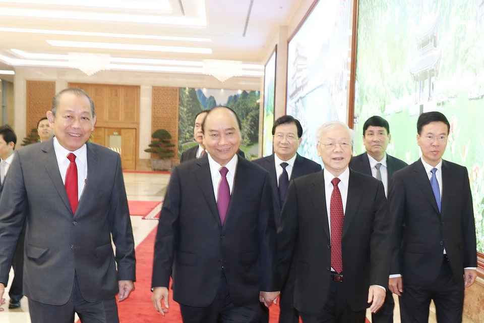 Tổng Bí thư, Chủ tịch nước Nguyễn Phú Trọng, Thủ tướng Chính phủ Nguyễn Xuân Phúc và các đại biểu đến dự Hội nghị. (Ảnh: Trí Dũng/TTXVN)