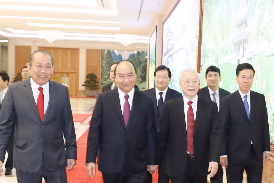 Tổng Bí thư, Chủ tịch nước Nguyễn Phú Trọng, Thủ tướng Chính phủ Nguyễn Xuân Phúc và các đại biểu đến dự Hội nghị. (Ảnh: Trí Dũng/TTXVN)