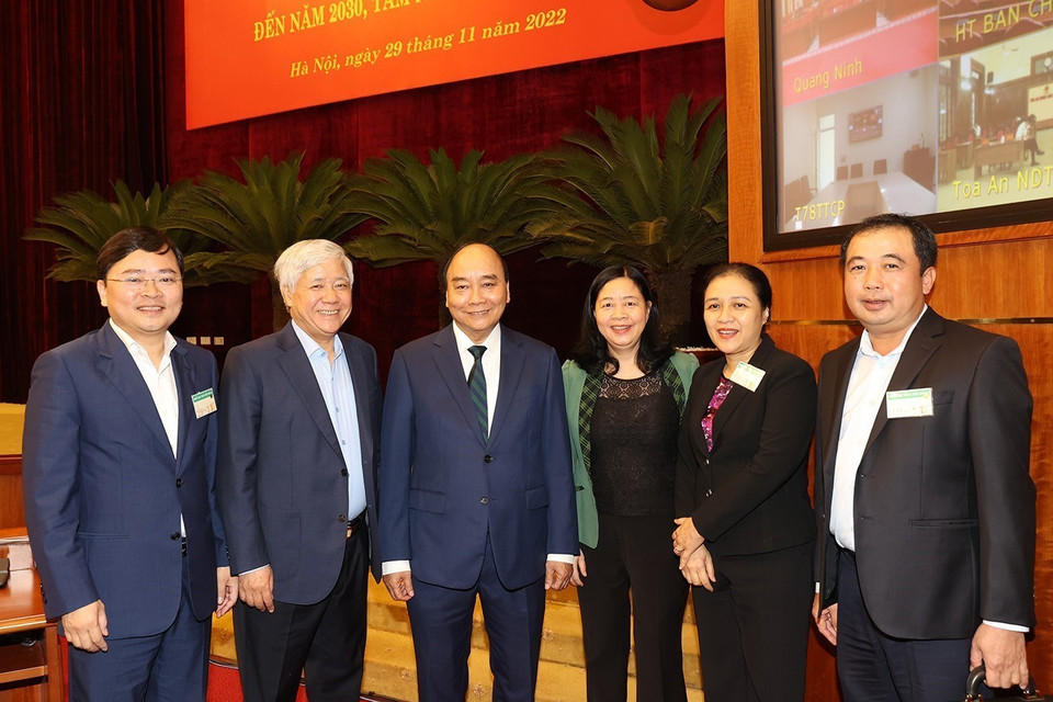 Chủ tịch nước Nguyễn Xuân Phúc với các đại biểu dự hội nghị. (Ảnh: Trí Dũng/TTXVN)