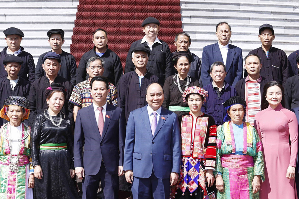 Chủ tịch nước Nguyễn Xuân Phúc gặp mặt đoàn đại biểu người có uy tín tiêu biểu tỉnh Hà Giang. (Ảnh: Thống Nhất/TTXVN)