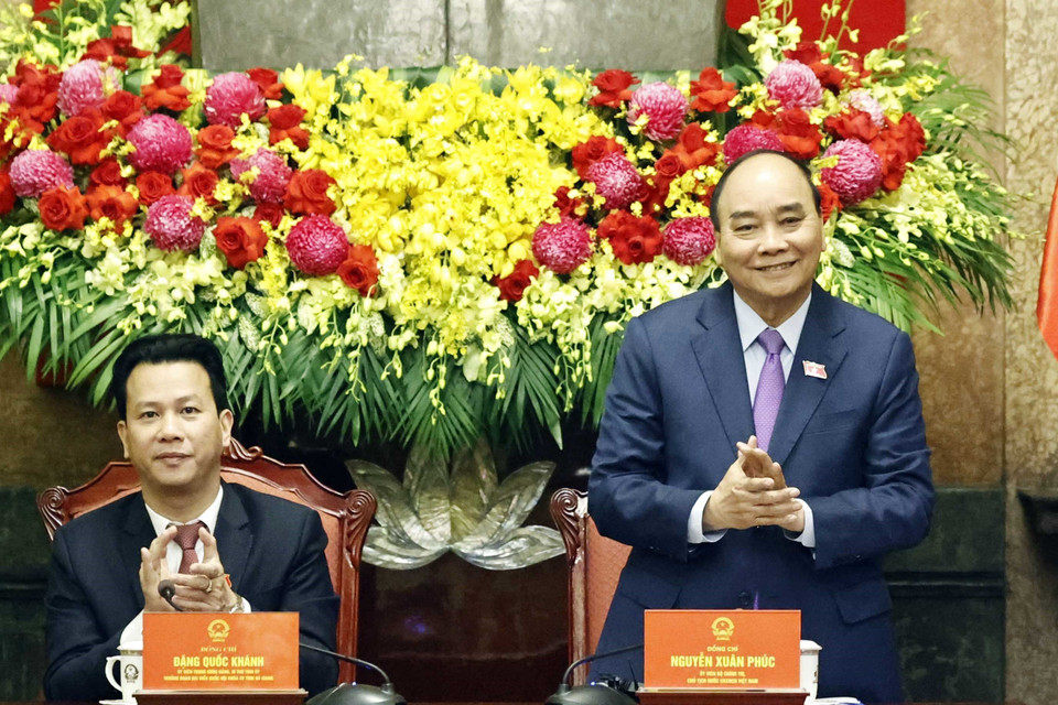 Chủ tịch nước Nguyễn Xuân Phúc tại buổi gặp mặt đoàn đại biểu người có uy tín tiêu biểu tỉnh Hà Giang. (Ảnh: Thống Nhất/TTXVN)