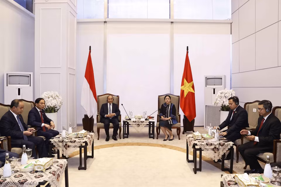 Chủ tịch nước Nguyễn Xuân Phúc hội kiến Chủ tịch Hội đồng Đại biểu nhân dân Indonesia, bà Puan Maharani. (Ảnh: Thống Nhất/TTXVN)