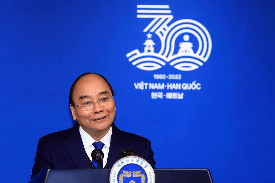 Chủ tịch nước Nguyễn Xuân Phúc phát biểu tại buổi họp báo.(Ảnh: Thống Nhất/TTXVN)