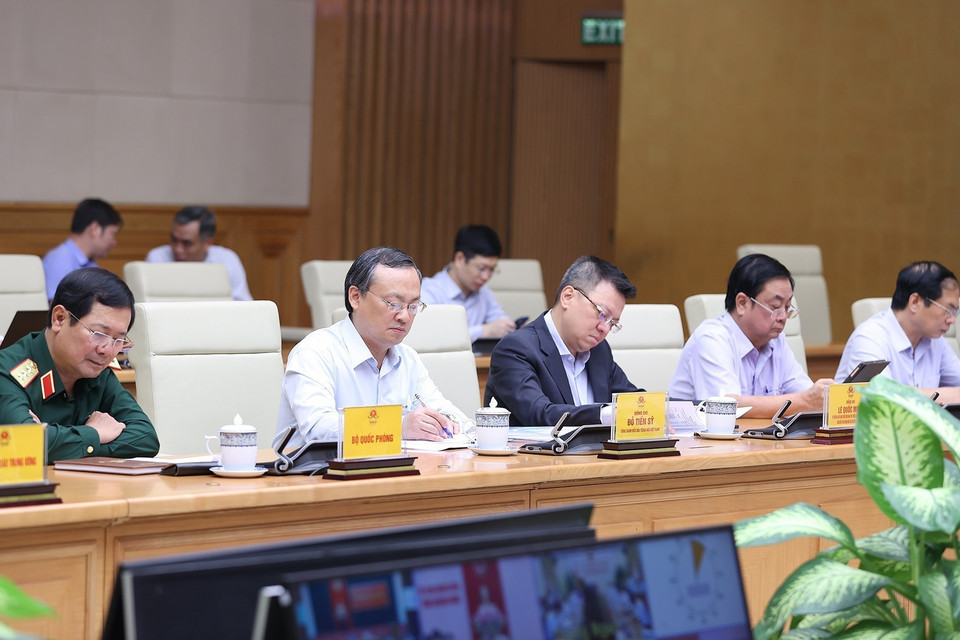 Các thành viên Ban Chỉ đạo phòng, chống dịch COVID-19 tham dự phiên họp tại điểm cầu Chính phủ. (Ảnh: Dương Giang/TTXVN)