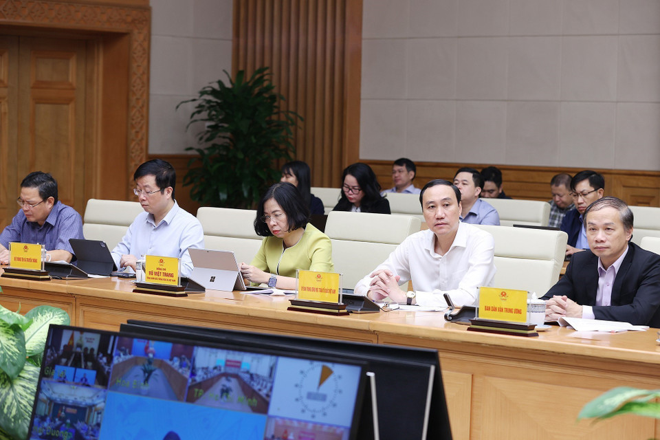 Các thành viên Ban Chỉ đạo phòng, chống dịch COVID-19 tham dự phiên họp tại điểm cầu Chính phủ. (Ảnh: Dương Giang/TTXVN)