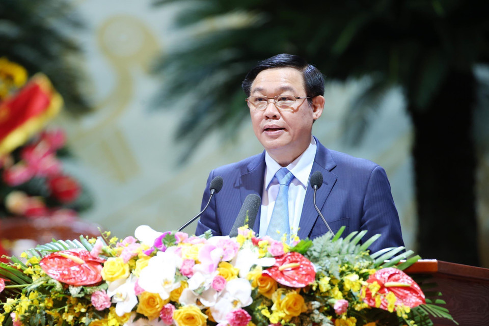  Ủy viên Bộ Chính trị, Phó Thủ tướng Vương Đình Huệ phát biểu với Đại hội về tình hình và nhiệm vụ phát triển kinh tế-xã hội của đất nước; công tác phối hợp giữa Chính phủ và Ủy ban Trung ương MTTQ Việt Nam. (Ảnh: TTXVN)