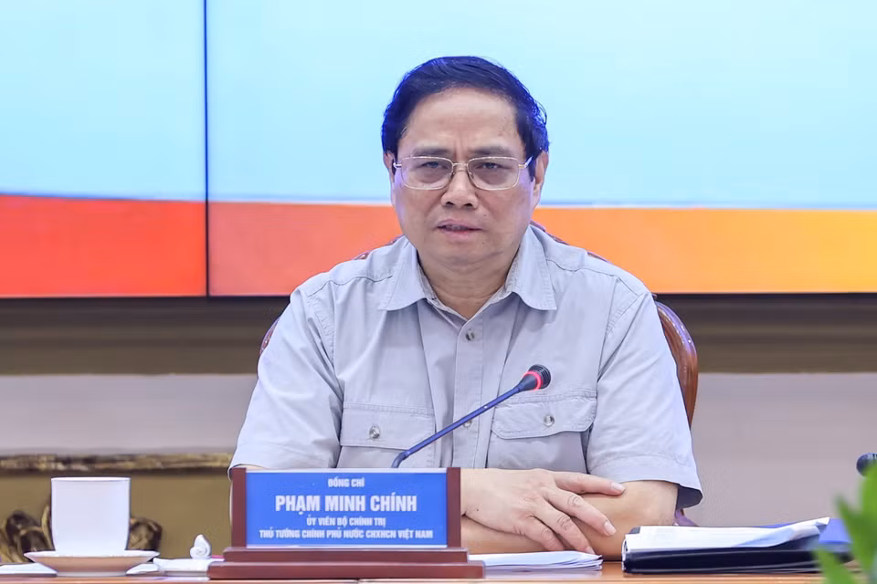 Thủ tướng Phạm Minh Chính chủ trì làm việc giữa Thường trực Chính phủ với Ban Thường vụ Thành ủy Thành phố Hồ Chí Minh. (Ảnh: Dương Giang/TTXVN)