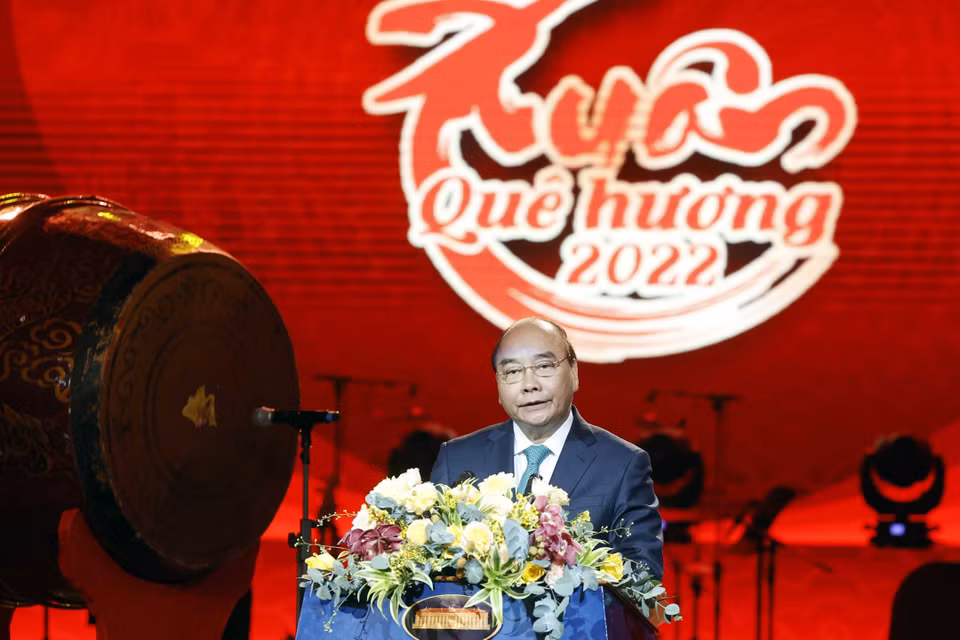 Chủ tịch nước Nguyễn Xuân Phúc phát biểu tại Chương trình Xuân Quê hương năm 2022. (Ảnh: Thống Nhất/TTXVN)