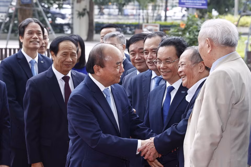 Chủ tịch nước Nguyễn Xuân Phúc với các đại biểu. (Ảnh: Thống Nhất/TTXVN)
