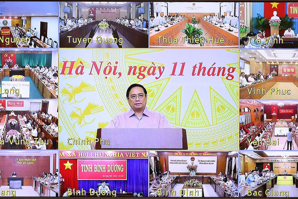 Thủ tướng Phạm Minh Chính chủ trì hội nghị tại điểm cầu Chính phủ. (Ảnh: Dương Giang/TTXVN)