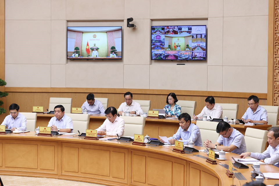 Lãnh đạo các bộ, cơ quan ngang bộ, cơ quan thuộc Chính phủ tham dự phiên họp. (Ảnh: Dương Giang/TTXVN)