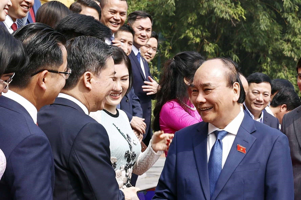 Chủ tịch nước Nguyễn Xuân Phúc với các đại biểu. (Ảnh: Thống Nhất/TTXVN)