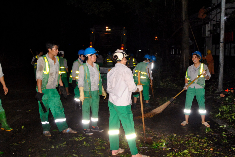'Cười lên, xong chỗ này ta qua chỗ khác.' (Ảnh: Võ Phương/Vietnam+)
