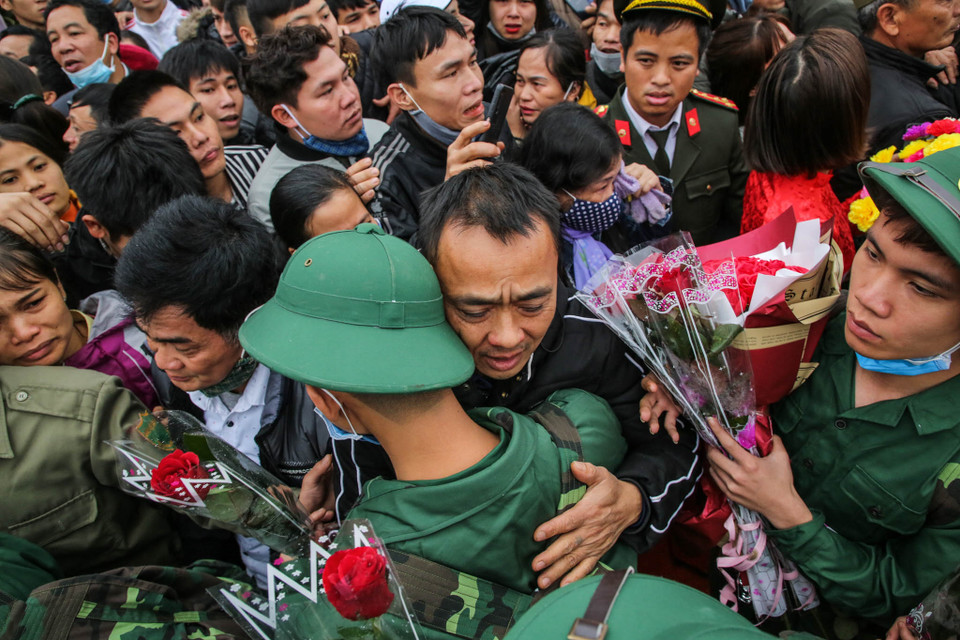 Lễ giao nhận quân năm nay tại các địa phương đã được nhanh gọn do ảnh hưởng của dịch nCoV. (Ảnh: Minh Sơn/Vietnam+)
