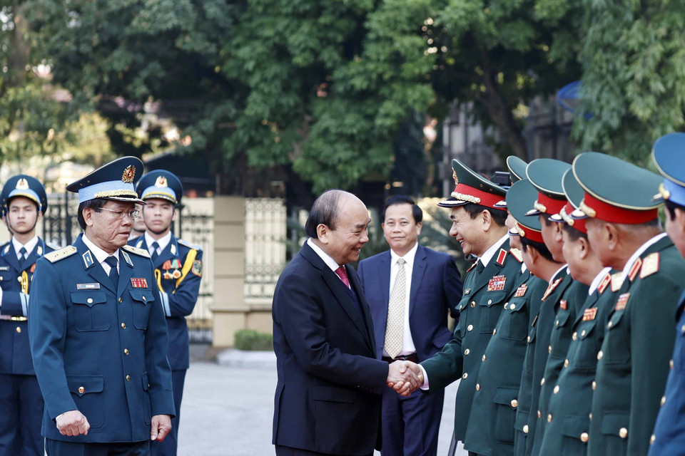 Chủ tịch nước Nguyễn Xuân Phúc dự Gặp mặt kỷ niệm 50 năm 'Chiến thắng Hà Nội-Điện Biên Phủ trên không.' (Ảnh: Thống Nhất/TTXVN)