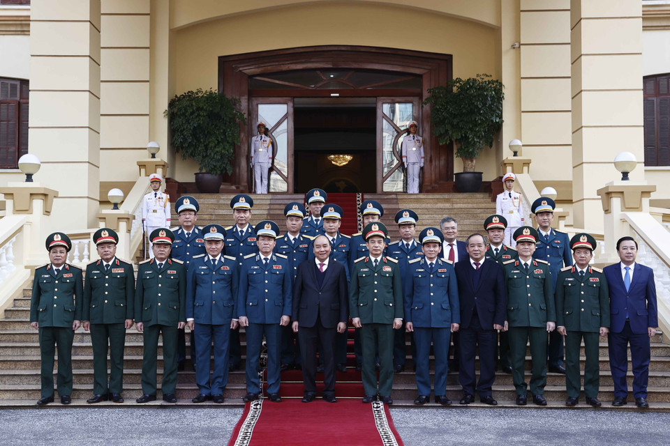 Chủ tịch nước Nguyễn Xuân Phúc với các đại biểu. (Ảnh: Thống Nhất/TTXVN)