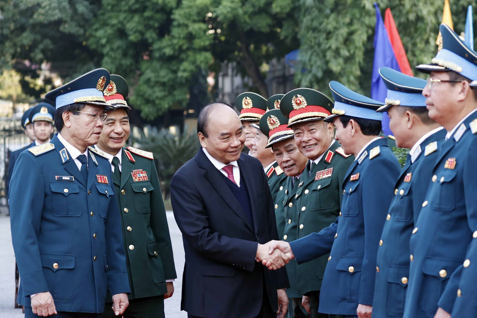 Chủ tịch nước Nguyễn Xuân Phúc với các đại biểu. (Ảnh: Thống Nhất/TTXVN)