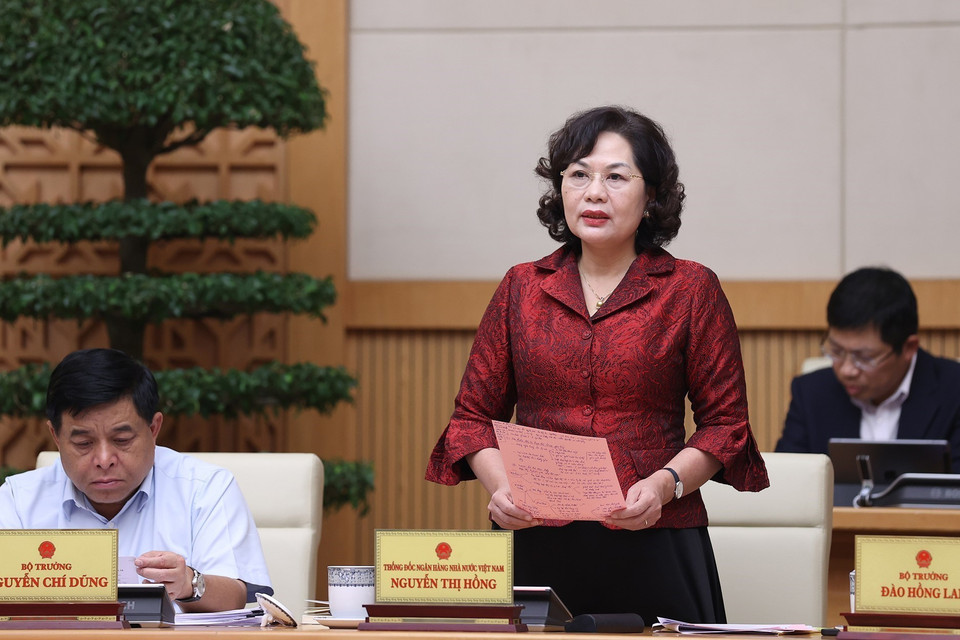 Thống đốc Ngân hàng Nhà nước Việt Nam Nguyễn Thị Hồng báo cáo công tác truyền thông chính sách của Ngân hàng Nhà nước. (Ảnh: Dương Giang/TTXVN)