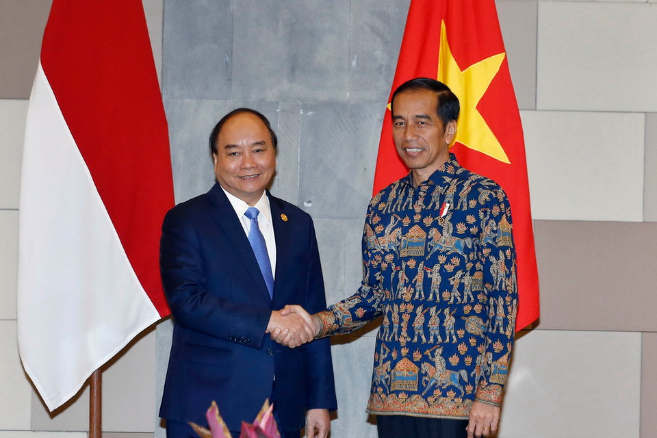 Thủ tướng Nguyễn Xuân Phúc hội đàm với Tổng thống Cộng hòa Indonesia Joko Widodo. (Ảnh: Thống Nhất/TTXVN)