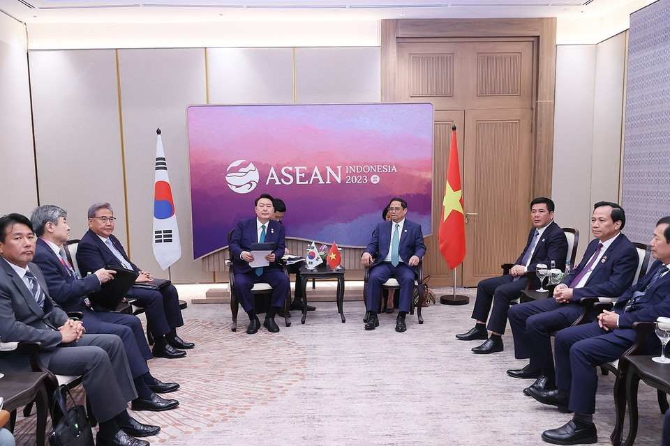  Thủ tướng Phạm Minh Chính gặp Tổng thống Hàn Quốc Yoon Suk Yeol. (Ảnh: Dương Giang/TTXVN) 