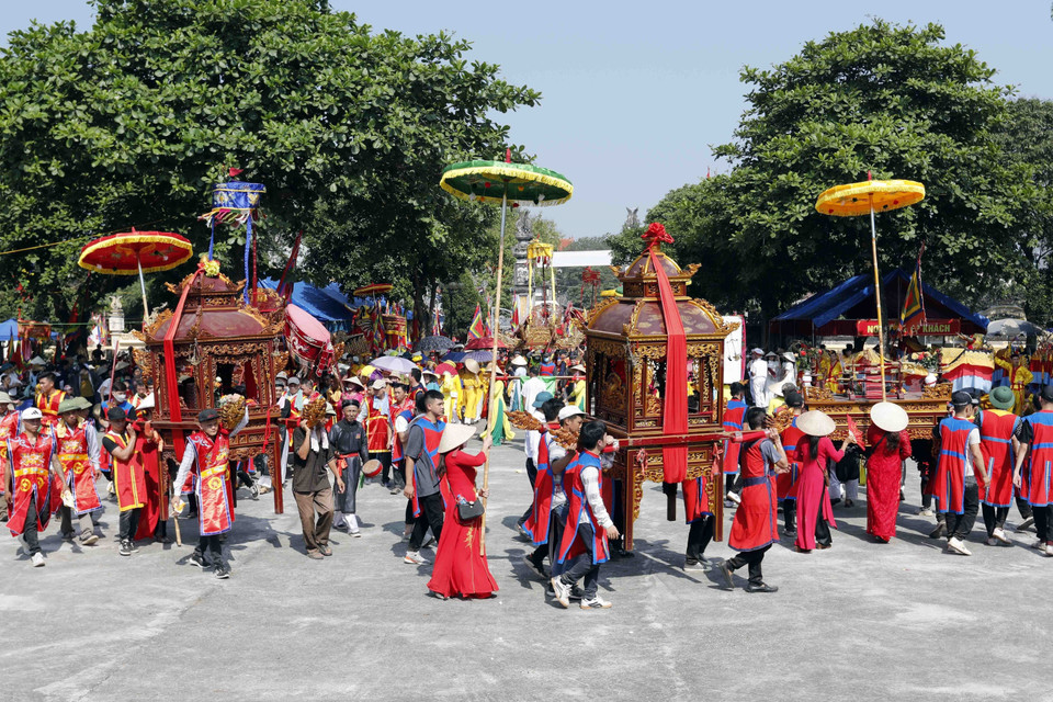 Màn rước kiệu tại lễ hội Chử Đồng Tử-Tiên Dung Công chúa. (Ảnh: Trấn Việt/TTXVN)