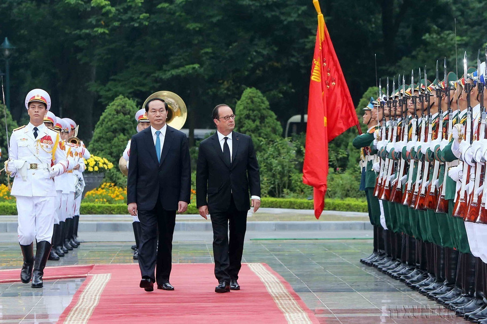 Chủ tịch nước Trần Đại Quang chủ trì lễ đón Tổng thống Pháp Francois Hollande thăm chính thức Việt Nam từ ngày 5-7/9/2016. (Ảnh: Nhan Sáng/TTXVN)