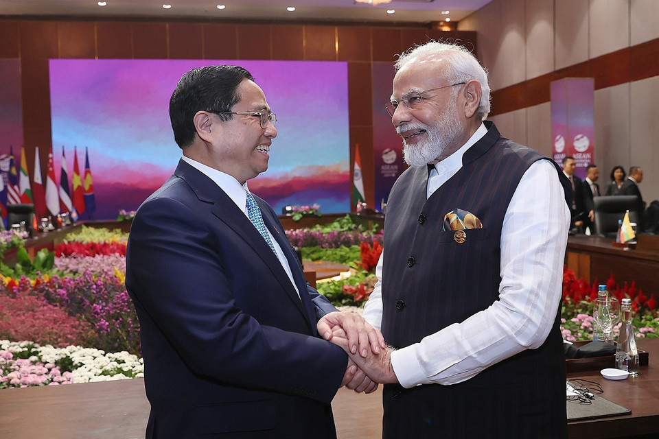 Thủ tướng Phạm Minh Chính trao đổi với Thủ tướng Ấn Độ Narendra Modi tại Hội nghị Cấp cao ASEAN-Ấn Độ lần thứ 20. (Ảnh: Dương Giang/TTXVN)