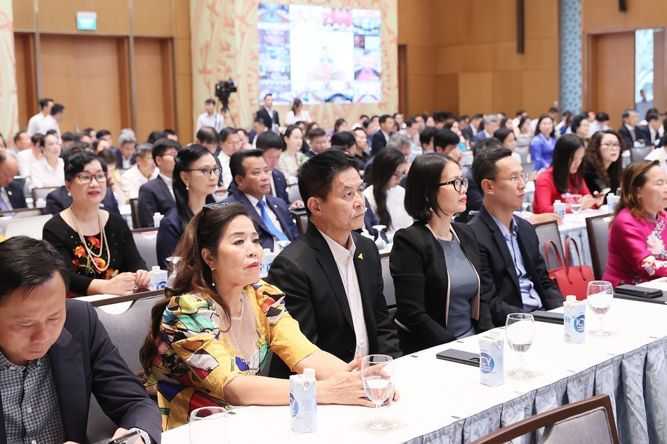 Các doanh nhân tham dự buổi gặp. (Ảnh: Dương Giang/TTXVN)