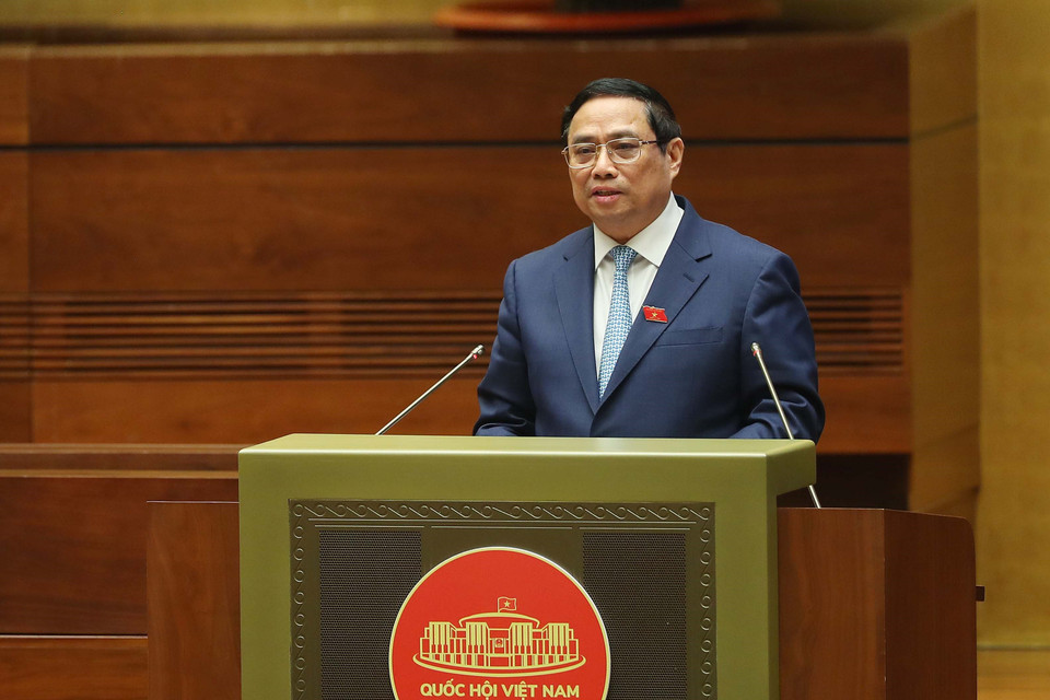 Thủ tướng Phạm Minh Chính báo cáo giải trình, làm rõ các vấn đề liên quan và trả lời chất vấn của đại biểu Quốc hội. (Ảnh: An Đăng/TTXVN)