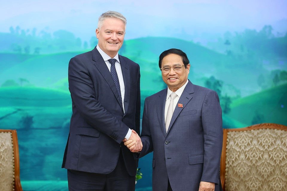 Thủ tướng Phạm Minh Chính tiếp Tổng Thư ký OECD Mathias Cormann. (Ảnh: Dương Giang/TTXVN) 