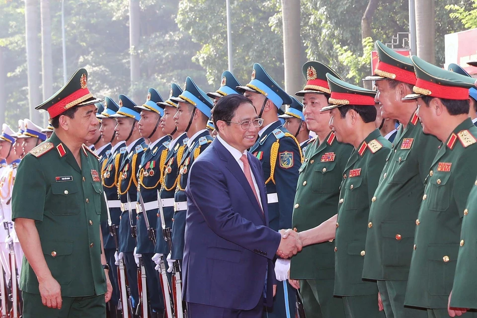 Sáng 18/5/2023, tại Hà Nội, Thủ tướng Phạm Minh Chính tới dự Chương trình tổng kết, trao Giải thưởng Tuổi trẻ sáng tạo trong Quân đội lần thứ 23. (Ảnh: Trọng Đức/TTXVN)
