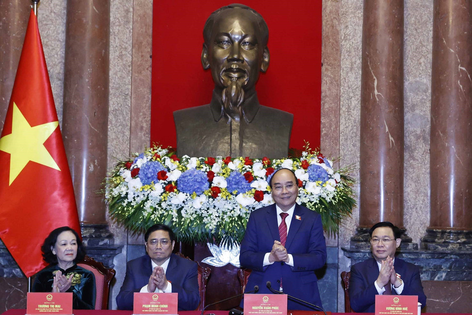 Chủ tịch nước Nguyễn Xuân Phúc và các lãnh đạo Đảng, Nhà nước tại buổi gặp mặt. (Ảnh: Thống Nhất/TTXVN)