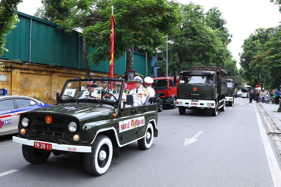 Lễ di quan nguyên Phó Thủ tướng Vũ Khoan về nơi an nghỉ cuối cùng. (Ảnh: Phạm Kiên/TTXVN)
