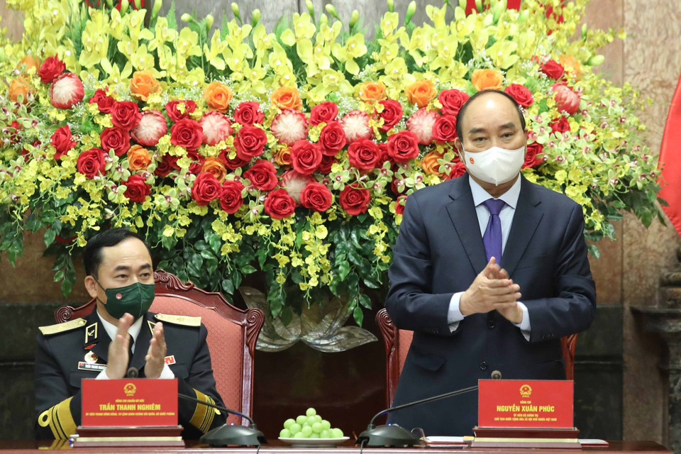 Chủ tịch nước Nguyễn Xuân Phúc phát biểu tại buổi gặp mặt.(Ảnh: Thống Nhất/TTXVN)