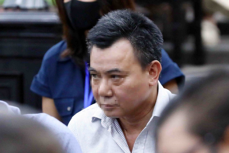 Bị cáo Nguyễn Anh Tuấn, cựu Phó Giám đốc Công an thành phố Hà Nội, nghe tòa tuyên án. (Ảnh: Phạm Kiên/TTXVN)