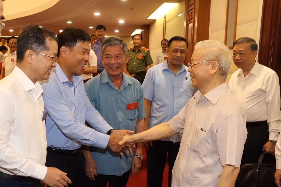 Tổng Bí thư Nguyễn Phú Trọng với các đại biểu dự hội nghị. (Ảnh: Trí Dũng/TTXVN)