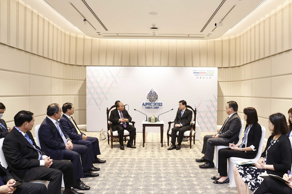 Quang cảnh buổi gặp của Chủ tịch nước Nguyễn Xuân Phúc và ông Lý Gia Siêu, Trưởng Khu hành chính đặc biệt Hong Kong- Trung Quốc. (Ảnh: Thống Nhất/TTXVN)