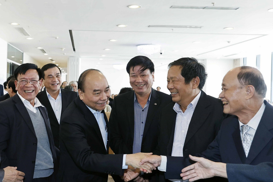 Chủ tịch nước Nguyễn Xuân Phúc và các đại biểu. (Ảnh: Thống Nhất/TTXVN)