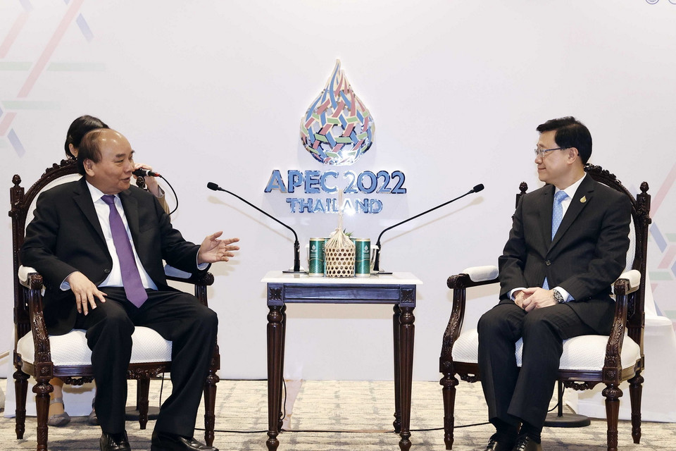 Sáng 19/11, tại thủ đô Bangkok, Thái Lan, Chủ tịch nước Nguyễn Xuân Phúc gặp ông Lý Gia Siêu, Trưởng Khu hành chính đặc biệt Hong Kong-Trung Quốc. (Ảnh: Thống Nhất/TTXVN)