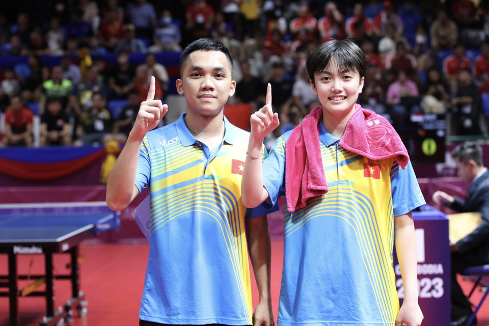 Cặp vận động viên Đinh Anh Hoàng và Trần Mai Ngọc. (Ảnh: TTXVN)