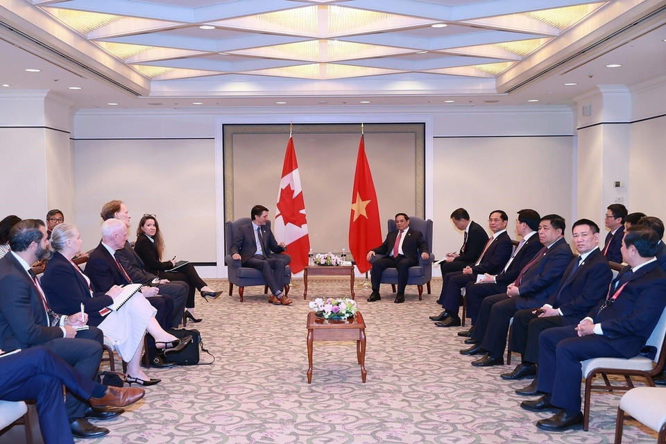 Thủ tướng Phạm Minh Chính gặp Thủ tướng Canada Justin Trudeau. (Ảnh: Dương Giang/TTXVN)