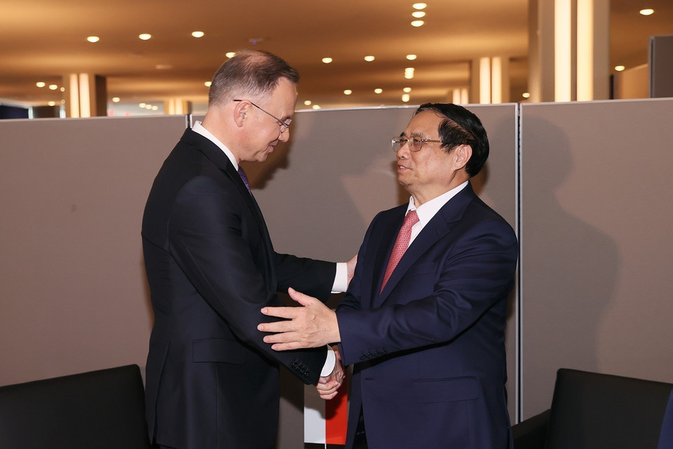 Thủ tướng Phạm Minh Chính gặp Tổng thống Ba Lan Andrzej Duda. (Ảnh: Dương Giang/TTXVN)