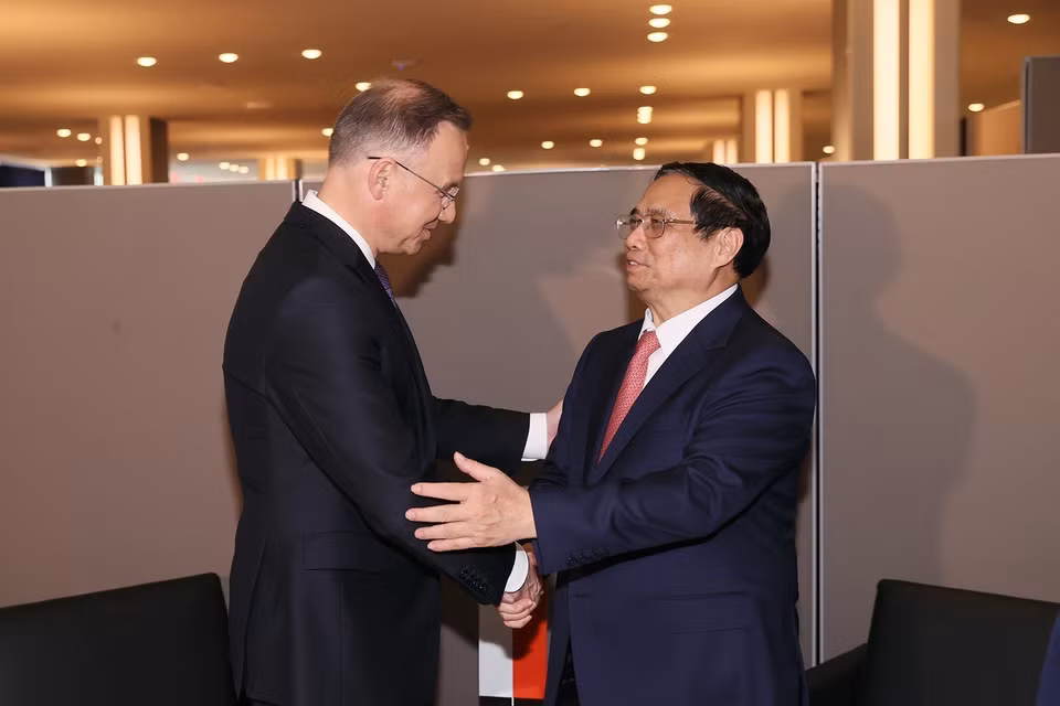 Thủ tướng Phạm Minh Chính gặp Tổng thống Ba Lan Andrzej Duda. (Ảnh: Dương Giang/TTXVN)