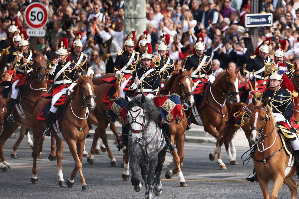 Màn trình diễn của đội kỵ binh. (Ảnh: AFP/TTXVN)
