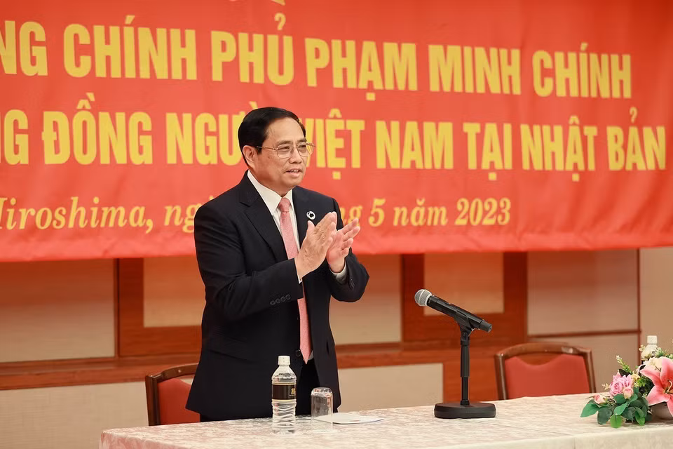 Thủ tướng Phạm Minh Chính gặp cộng đồng người Việt Nam tại Nhật Bản. (Ảnh: Dương Giang/TTXVN)