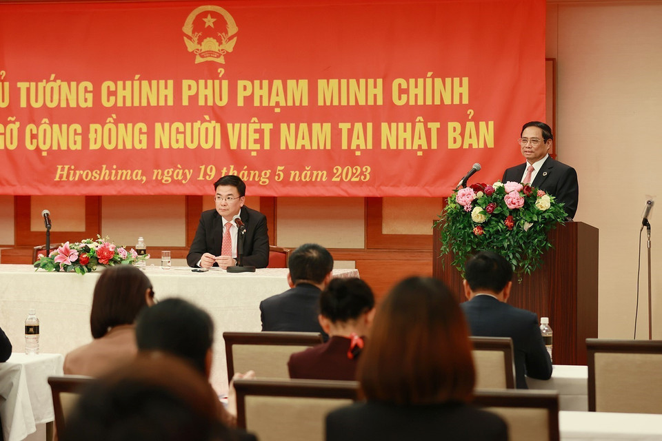 Thủ tướng Phạm Minh Chính phát biểu tại buổi gặp cộng đồng người Việt Nam tại Nhật Bản. (Ảnh: Dương Giang/TTXVN)
