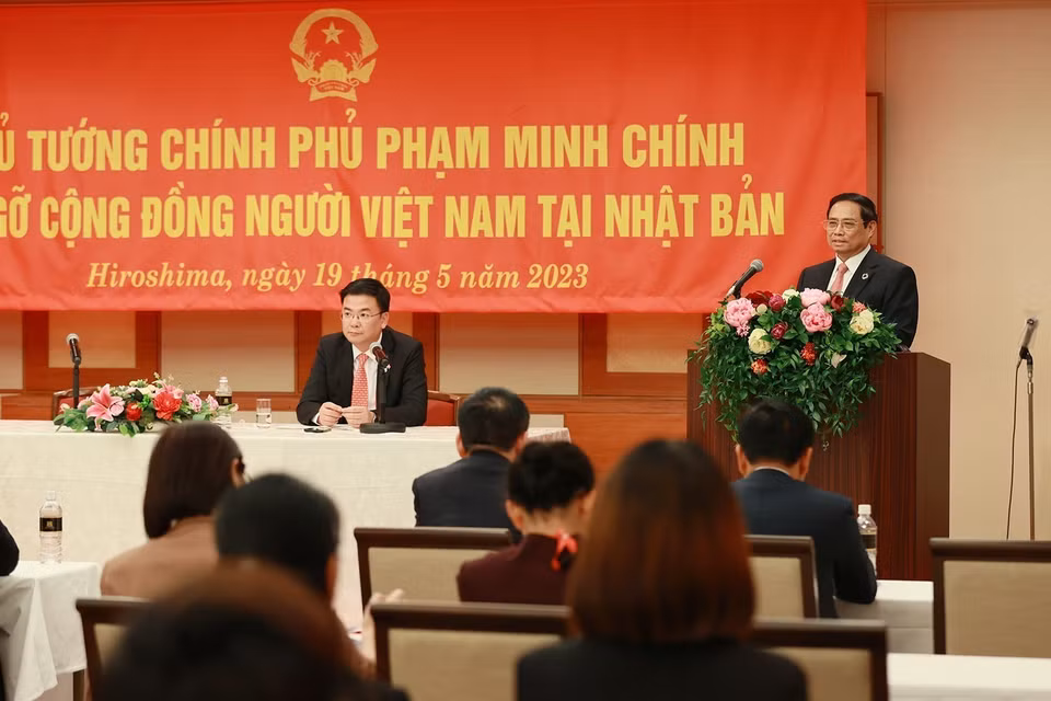 Thủ tướng Phạm Minh Chính phát biểu tại buổi gặp cộng đồng người Việt Nam tại Nhật Bản. (Ảnh: Dương Giang/TTXVN)