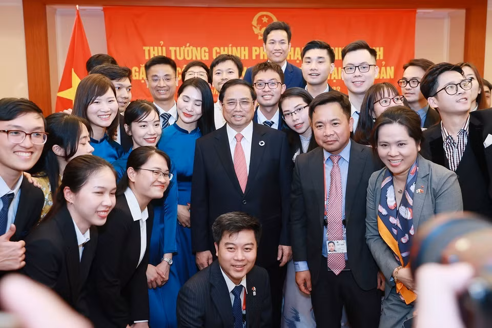 Thủ tướng Phạm Minh Chính với cộng đồng người Việt Nam tại Nhật Bản. (Ảnh: Dương Giang/TTXVN)